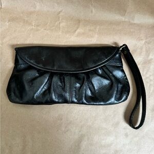 VTG Aldo Black Leather Clutch/Wristlet. 10”
By 5” by 0.5”